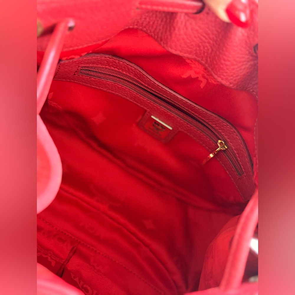 MCM Red Leather Bucket Bag
Crossbody Drawstring Gold Hardware - Picture 14 of 17